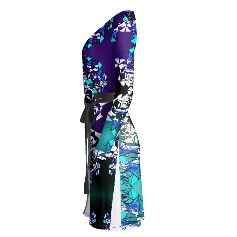 The Azure Kaleidoscope design is a masterclass in symmetry and color depth. Featuring a mesmerizing blend of royal blues, crystalline turquoises, and sharp white geometric accents, this pattern mimics the shifting beauty of a high-end kaleidoscope. On the Luxe Wrap Dress this print flows elegantly, creating a silhouette that is both artistic and sophisticated.